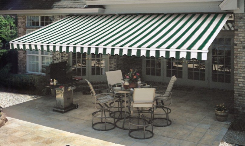 Patio with blue striped awning